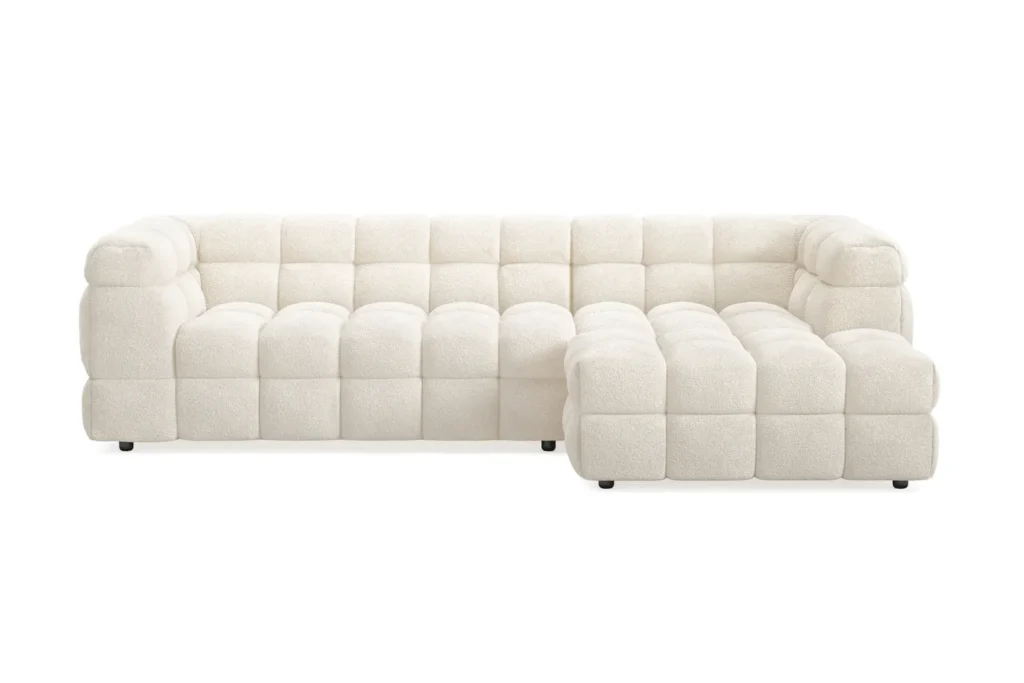 Bubblig soffa i teddy material och ljusbeige färg.
